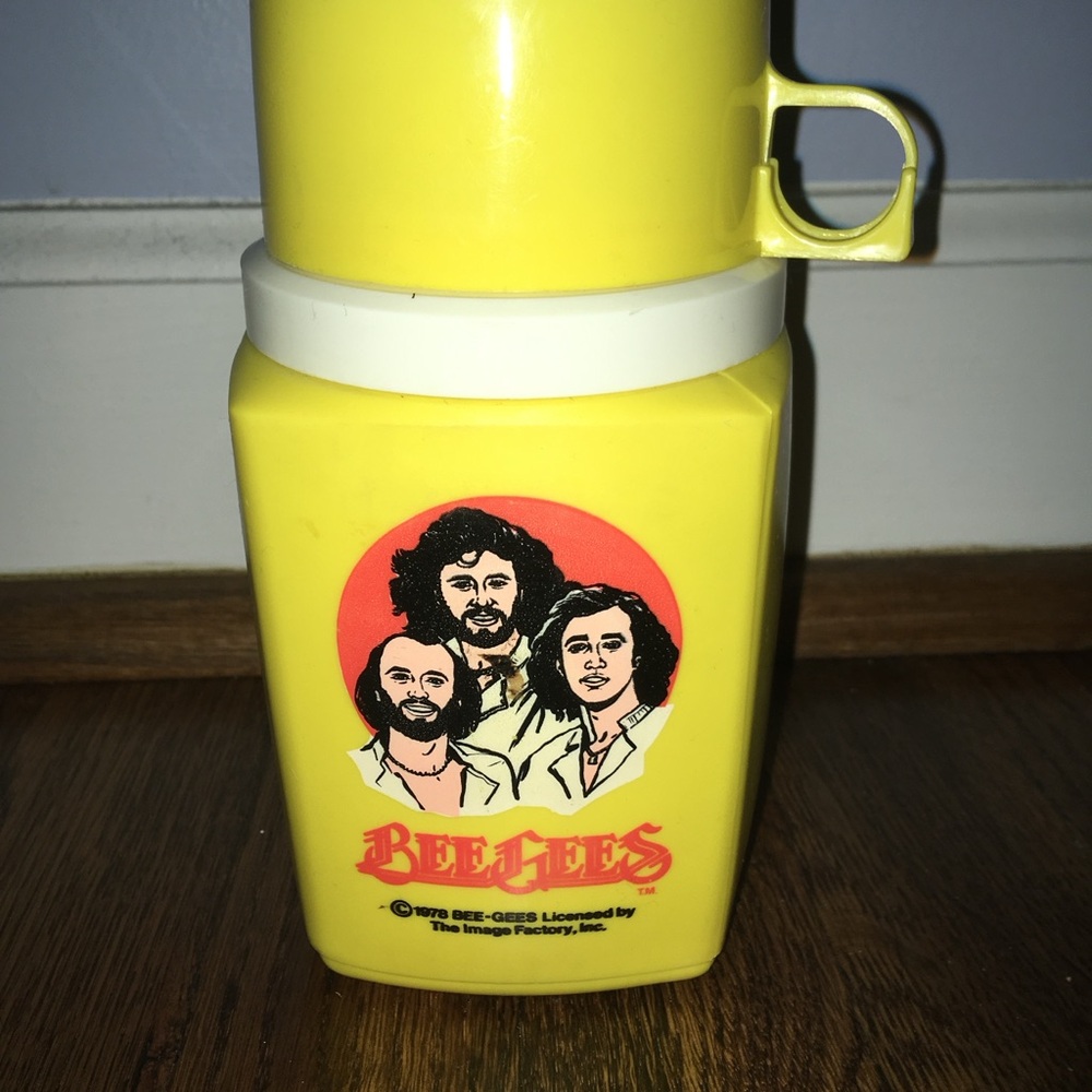 Vintage 1978 plastic BeeGees thermos by The Image Factory, yellow